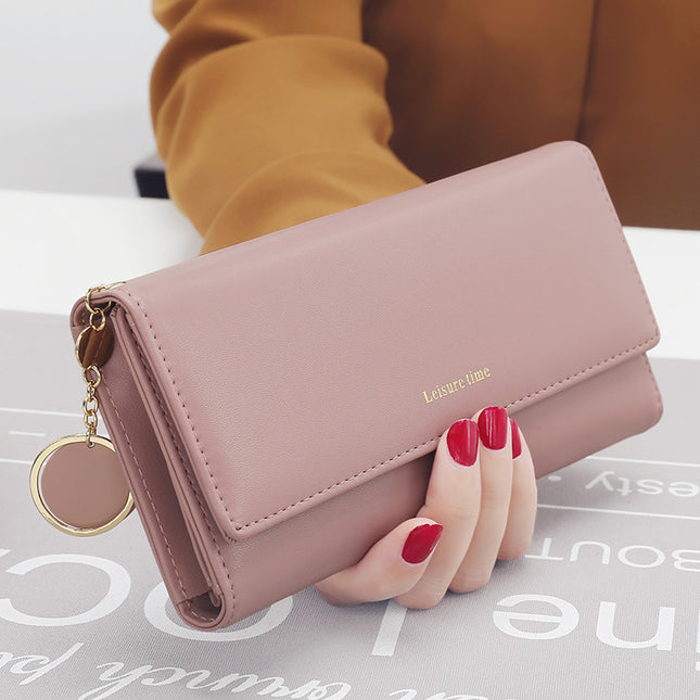 Women's hand holding wallet female long section 2021 new Japanese and Korean personality pendant multi-function student wallet